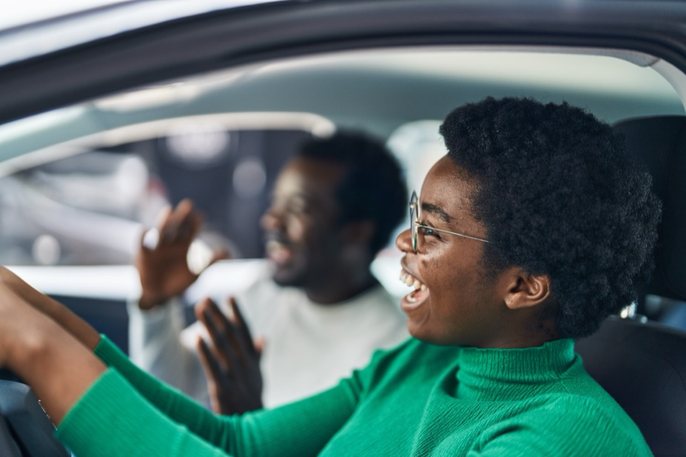 Students sharing a car ride in Abuja with Nylo